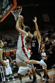 Chris Hansen, 20, goes for a basket against Whitworth University.