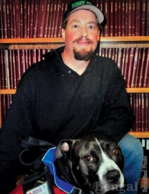 Josh Kelly and his service dog Cletis.