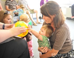 An instructor in the Occupational Therapy program shows students techniques for working with children. Topics like this will be presented at the treatment summit.