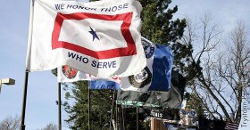 Many flags fly at the “Ride for the troops” event on Friday, April 12.