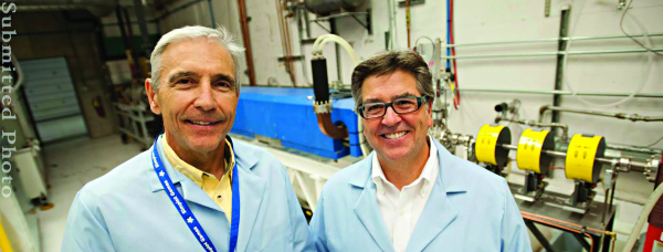 John Stoner, Idaho Accelerator Center Director of Technical Operations, and Howard Grimes, ISU Vice President for Research and Economic Development at the Idaho Accelerator Center.