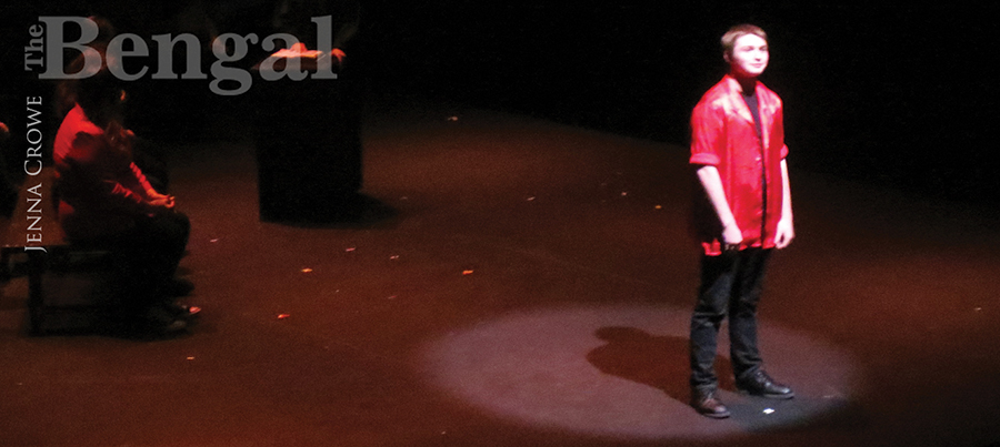 Actor in spotlight on stage