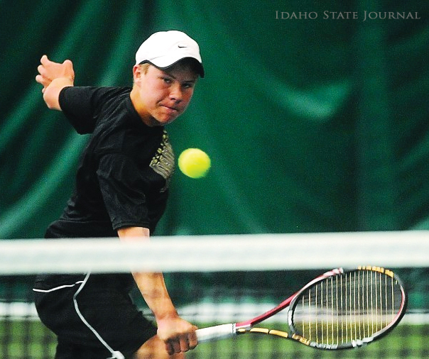 Josh Goodwin playing tennis.