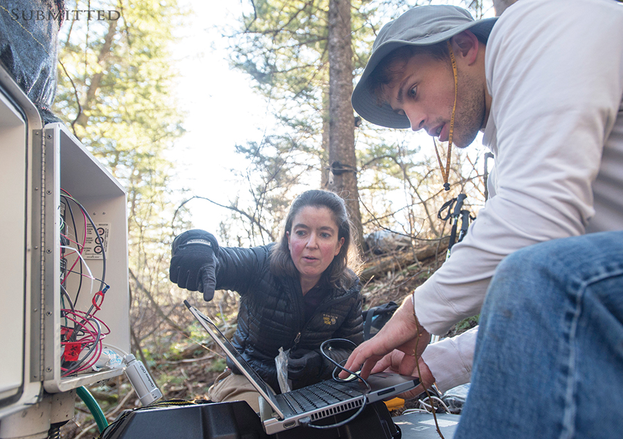 Sarah Godsey and student conducting field work.