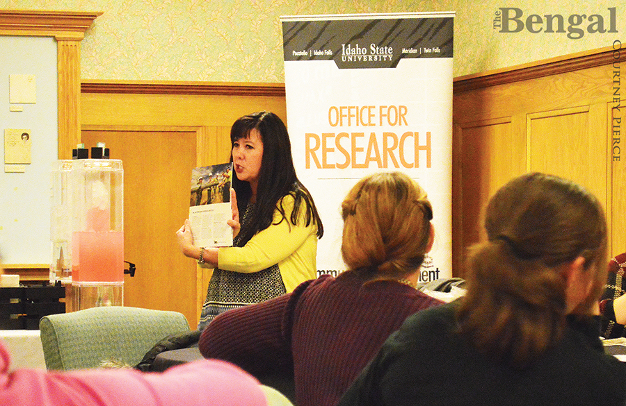 Woman presenting at STEM Cafe.