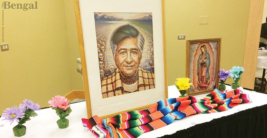 Table decorated with picture of Chavez and other decorations.