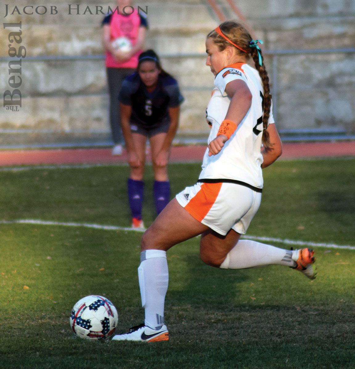 Jen McCaw playing soccer