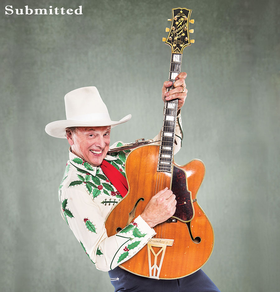 Riders in the Sky member with guitar