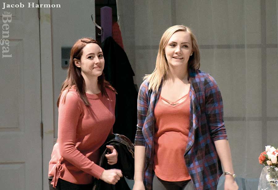 Two actresses on stage