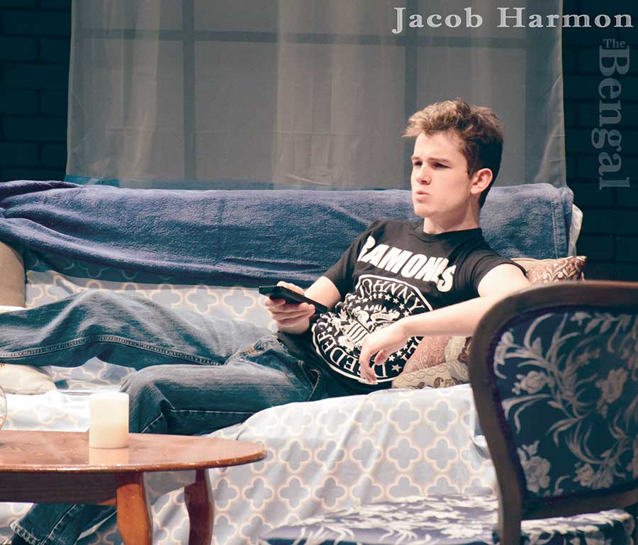 Actor lounging on a couch