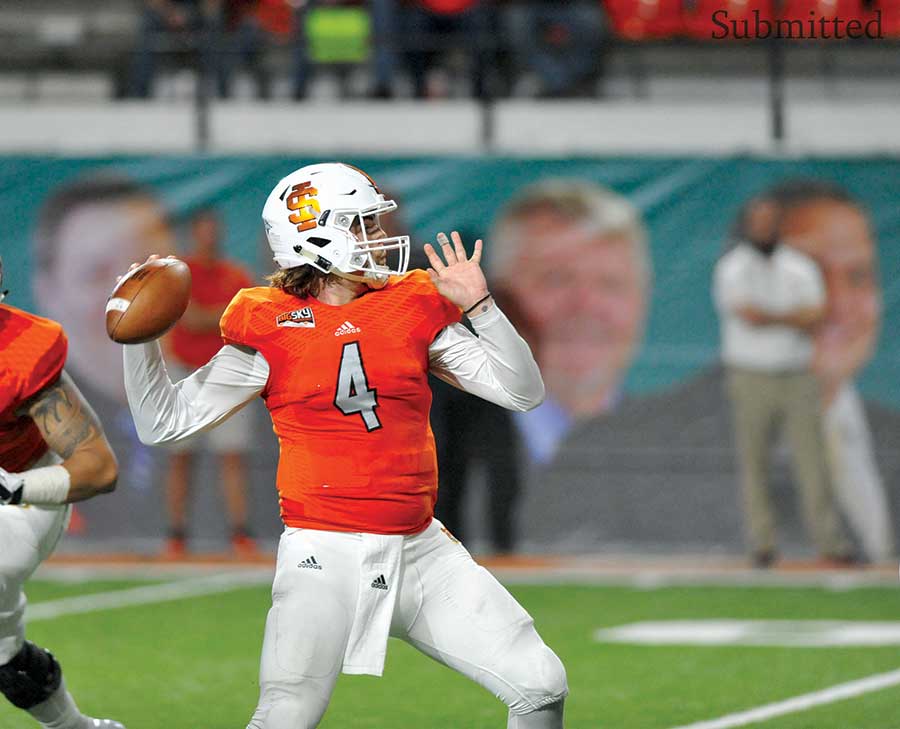 ISU football player in orange jersey