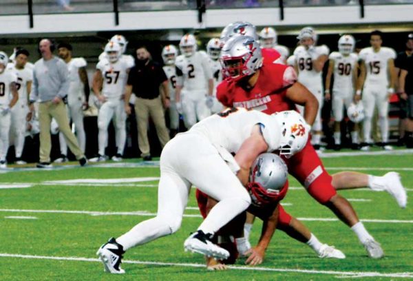 football players playing ball