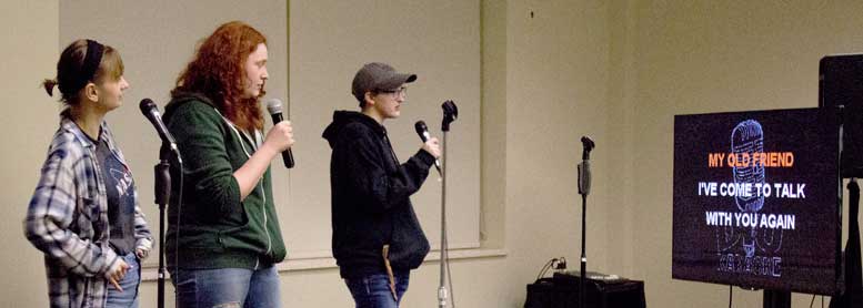 Three issue students sing karaoke