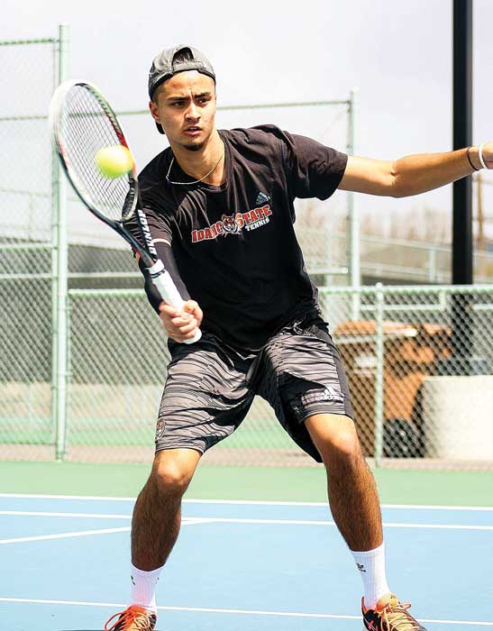 Flipovich returns tennis ball