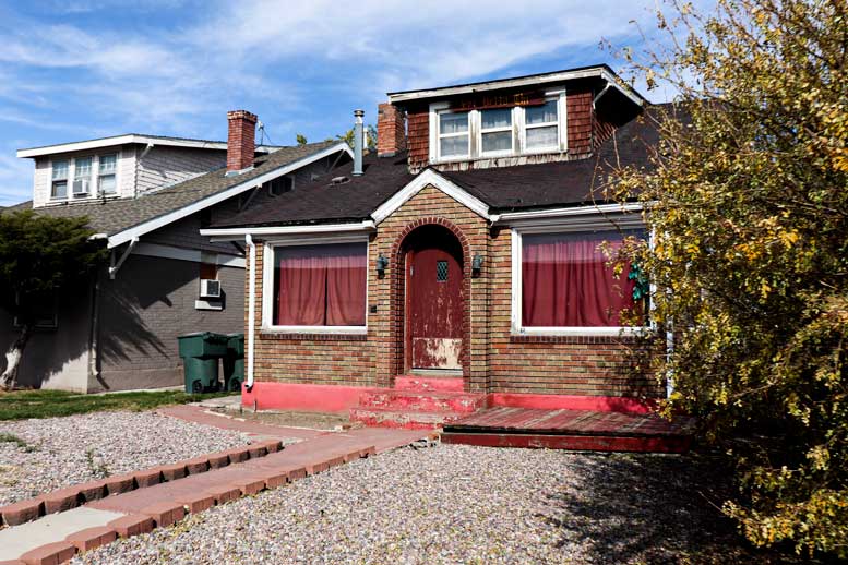 Outside of decrepit frat house