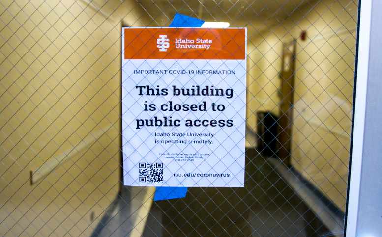 Sign posted on ISU building door stating the building is closed to public access