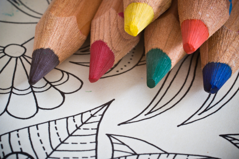 Color pencils and a coloring page