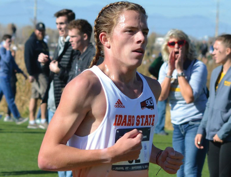 Joseph SImmons running in cross country race