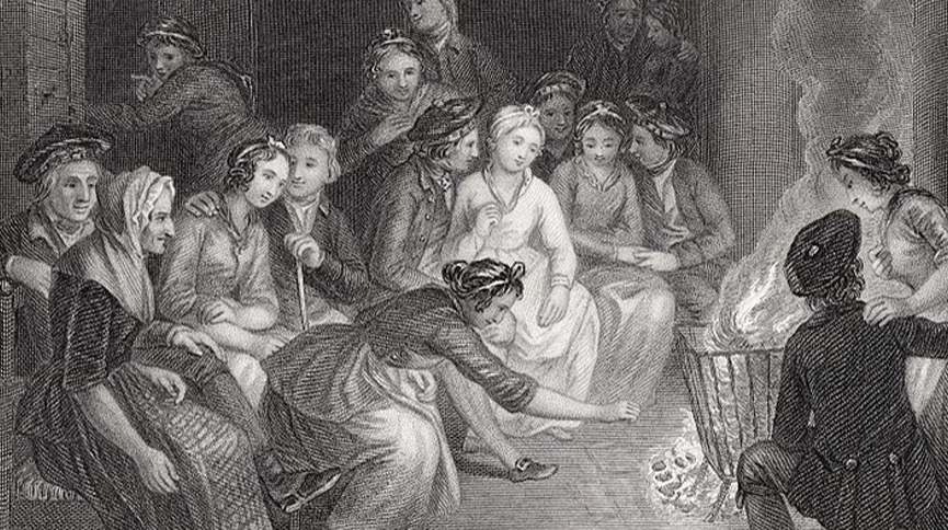 Historic black and white illustration of men and omwne sitting around the hearth.