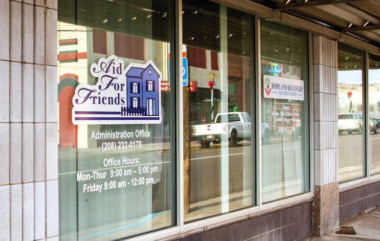 Outside doors of "Aid For Friends"