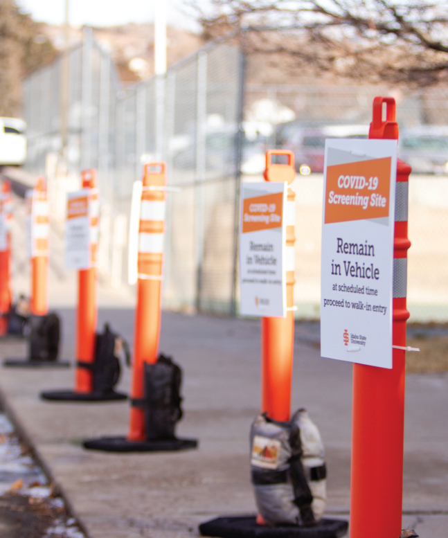 Traffic cones set up marking path for drive in COVID testing at ISU