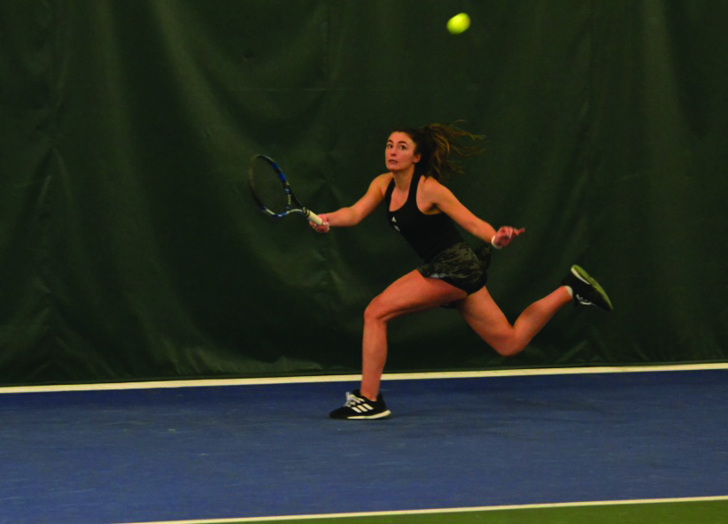 Featured: Angela Walker moves to return ball