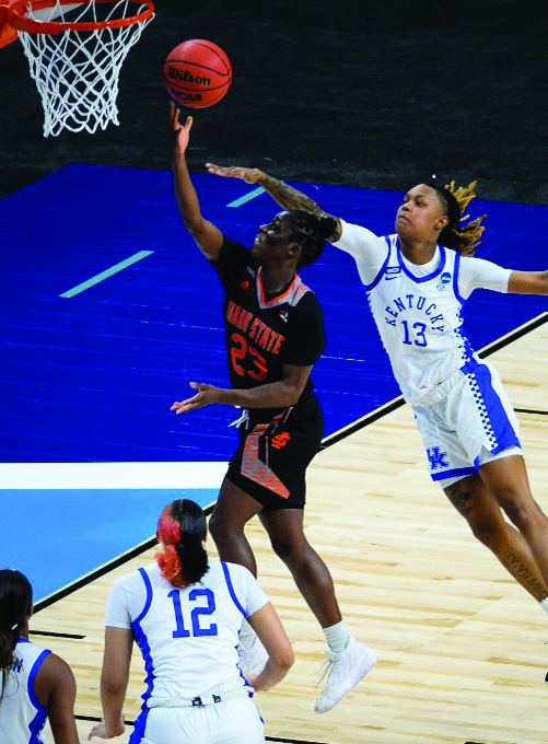 Featured: Diaba Konate goes up for a layup. Weber state player attempts to block from behind