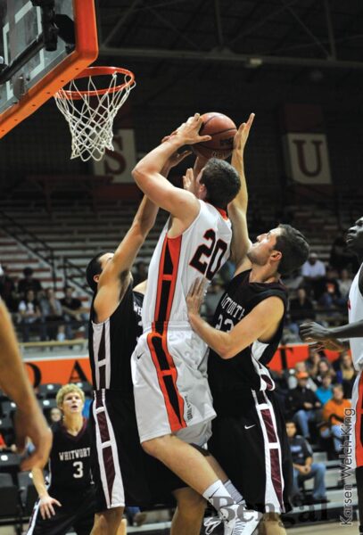 Chris Hansen, 20, shoots a basket against Whitworth University.