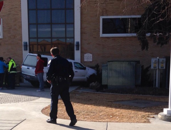 Vehicle strikes campus building, leaves one injured