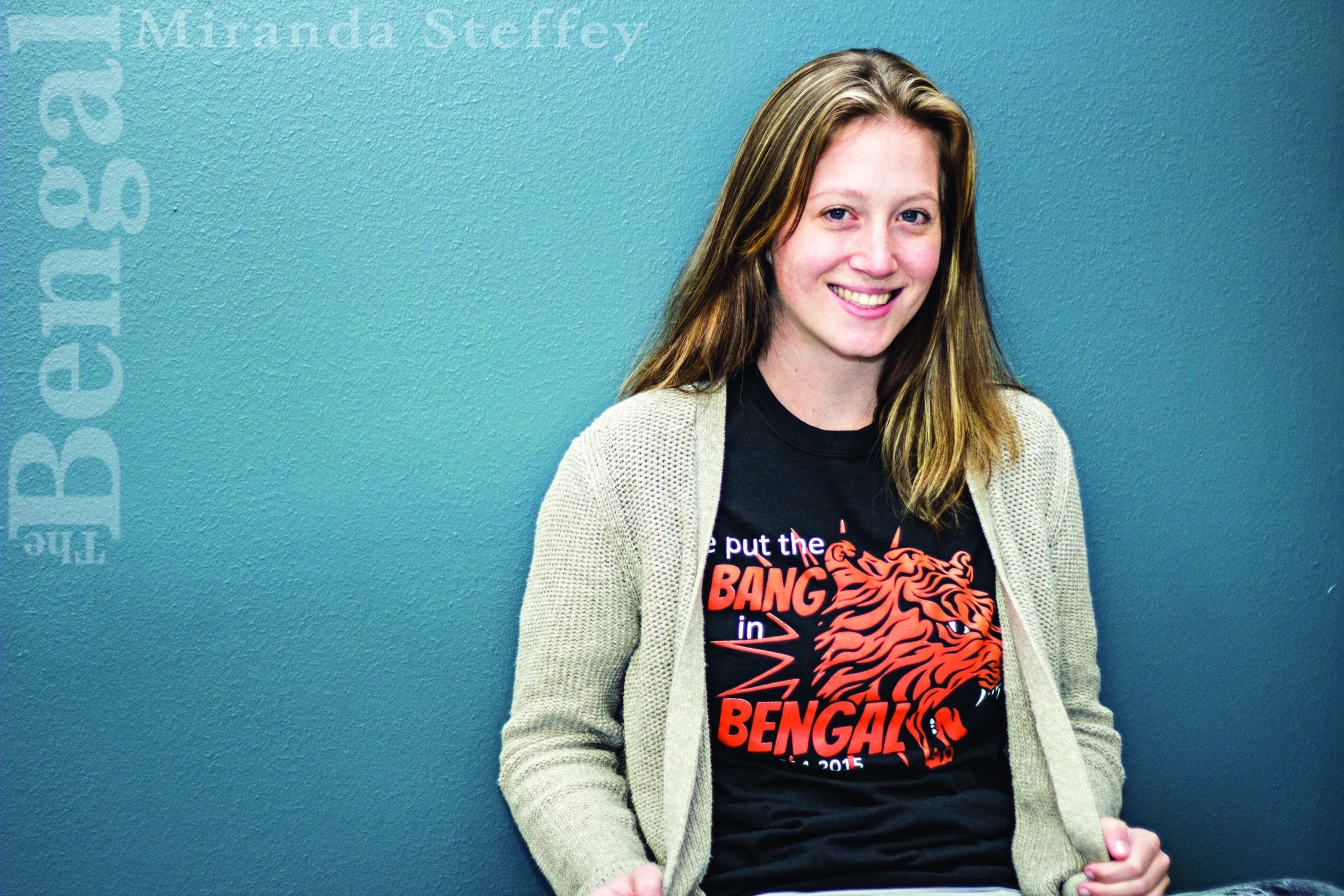 Gabrielle Boyd poses wearing the winning T-shirt that she designed.