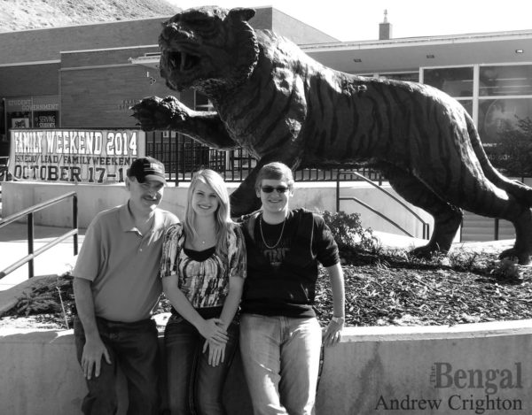 Crighton family in front of Bengal statue